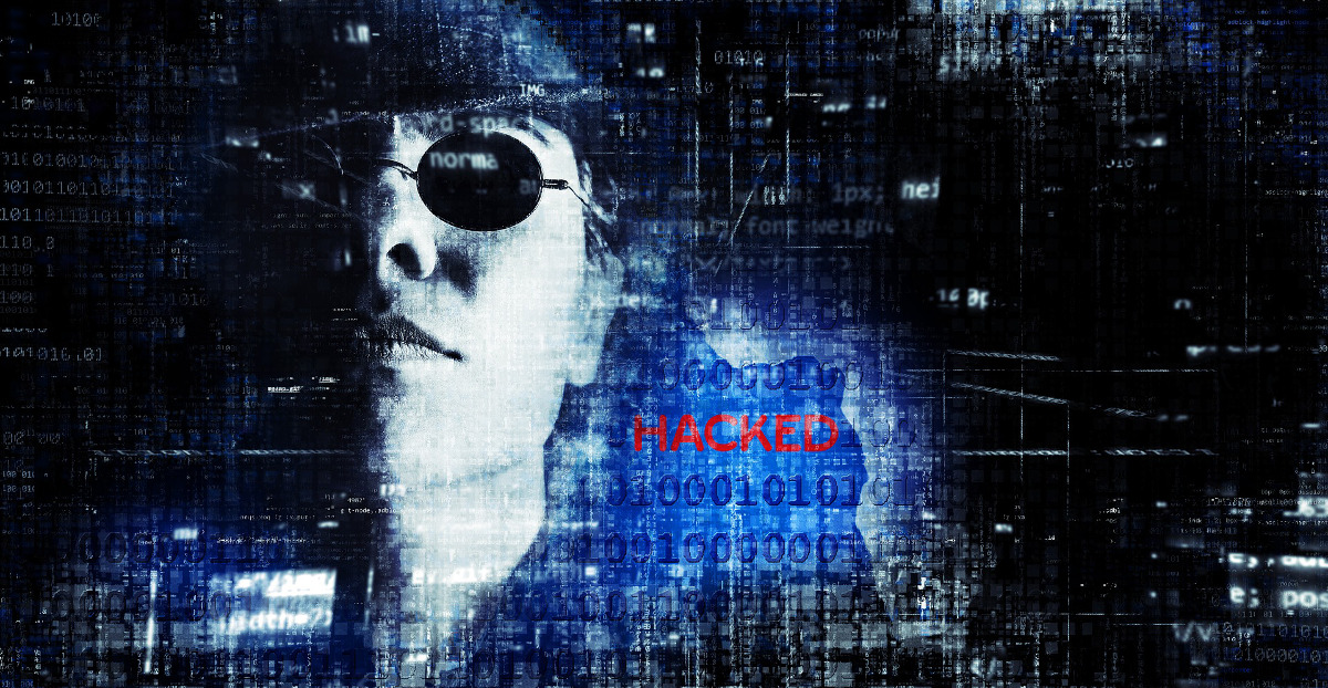 WannaCry Ransomeware auf dem Bild ein dunkelblauer Hintergrund mit 0 und 1 Code und dem Wort haked